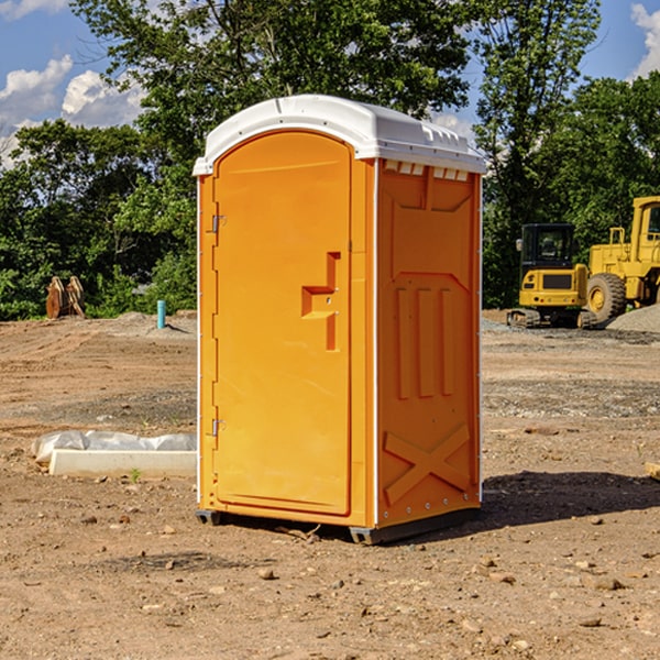 how often are the portable restrooms cleaned and serviced during a rental period in Angola